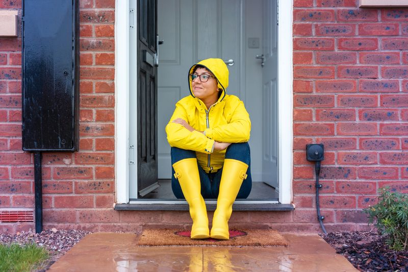 Frau im Regen