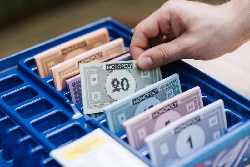 Brettspiel mit Spielgeld